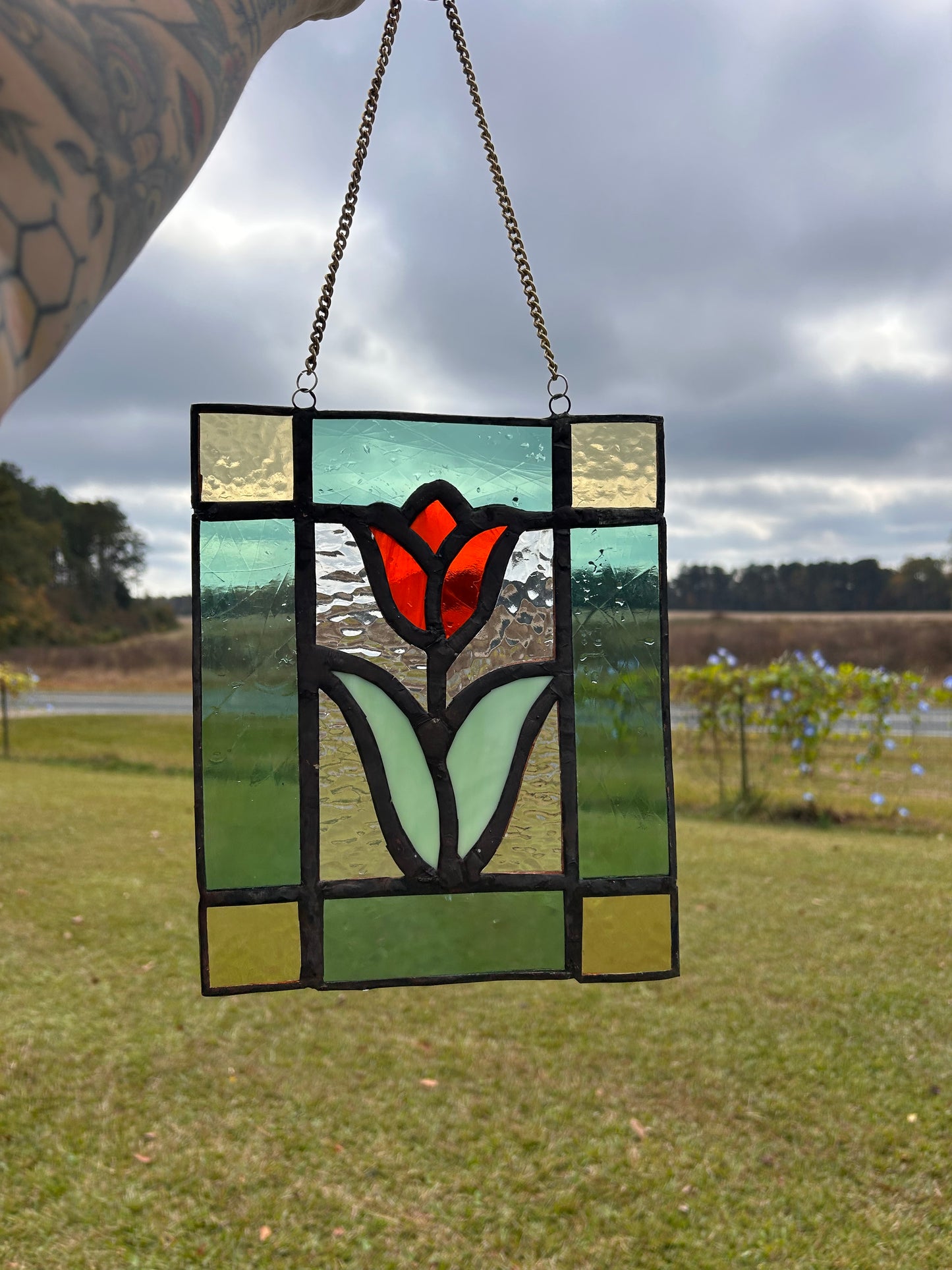 Orange tulip stained glass panel