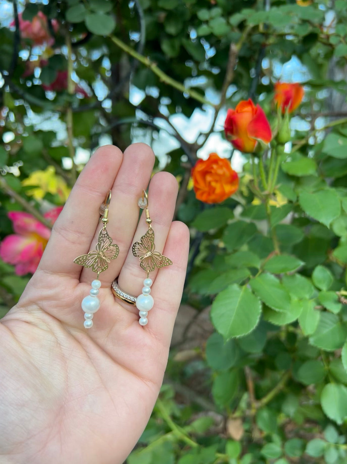 Butterfly pearl earrings