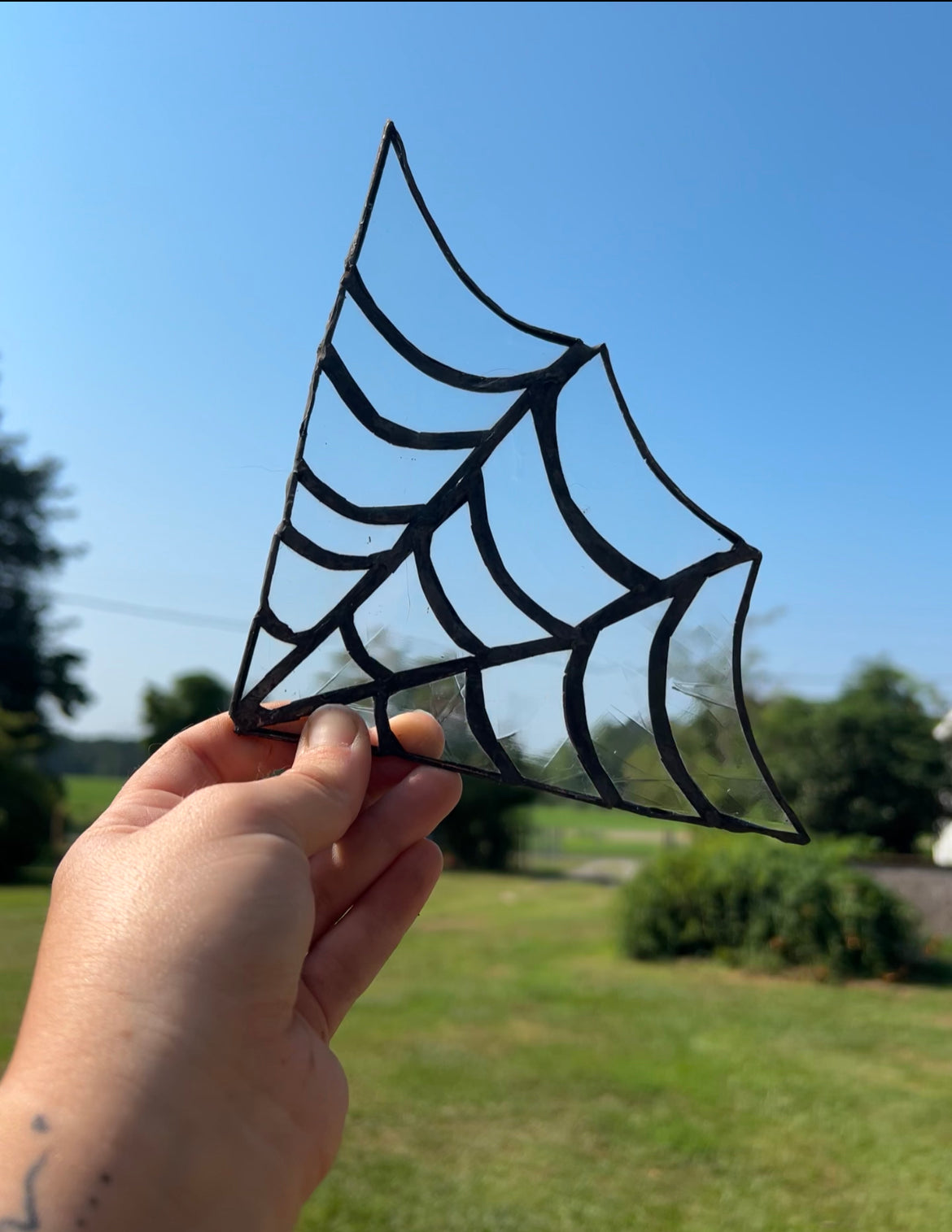 Stained glass spiderweb