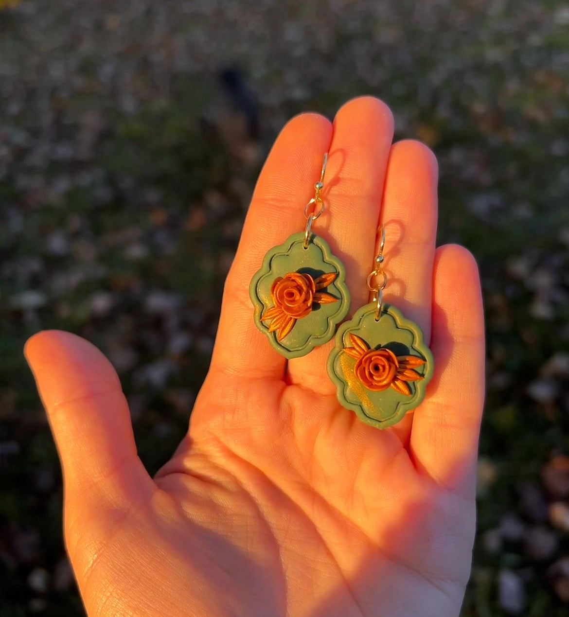 Gold rose earrings