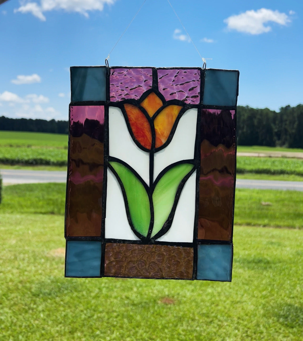 Stained glass framed tulip