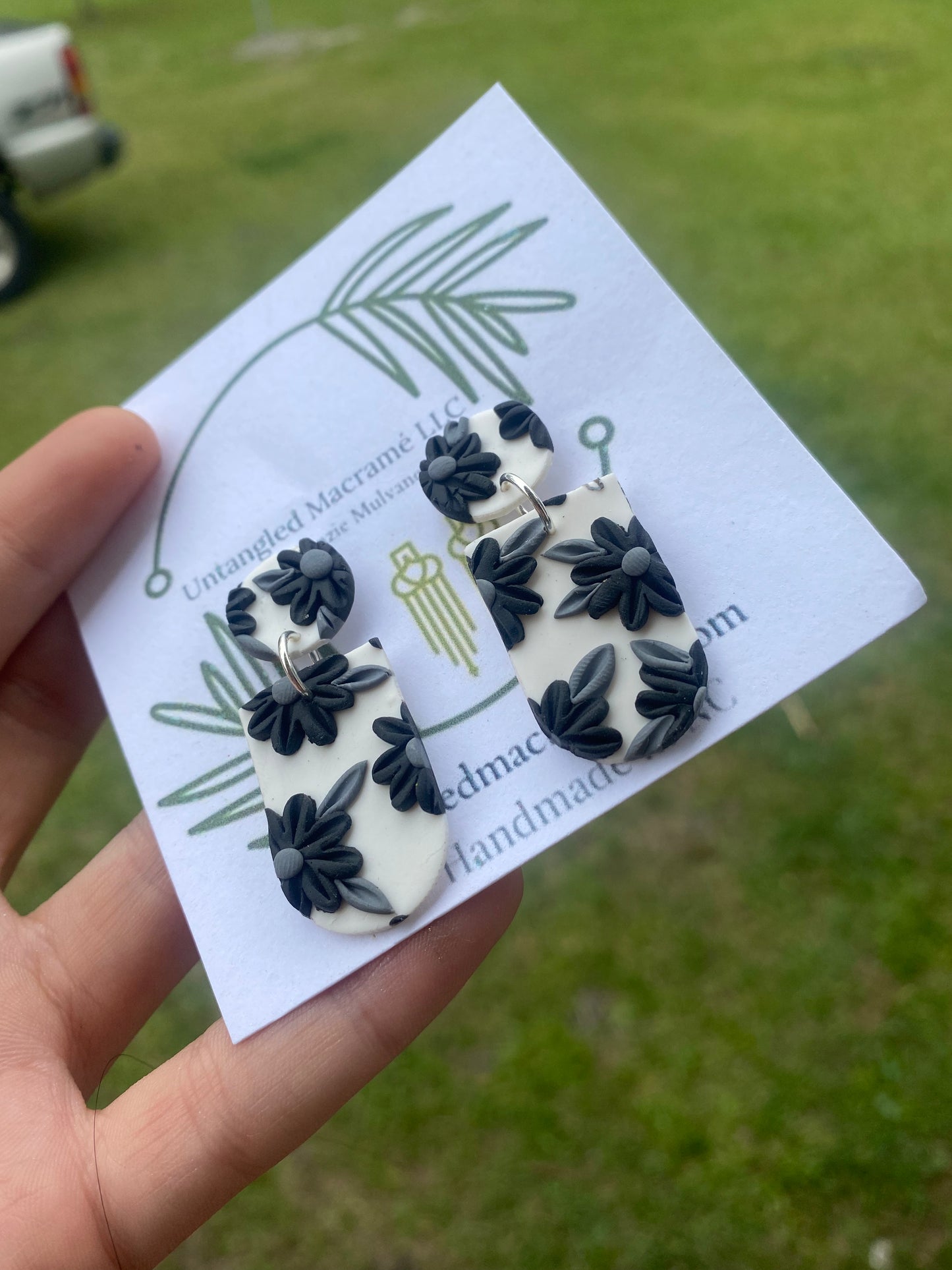 Black floral earrings