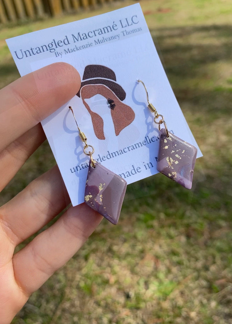 Purple and gold diamond earrings