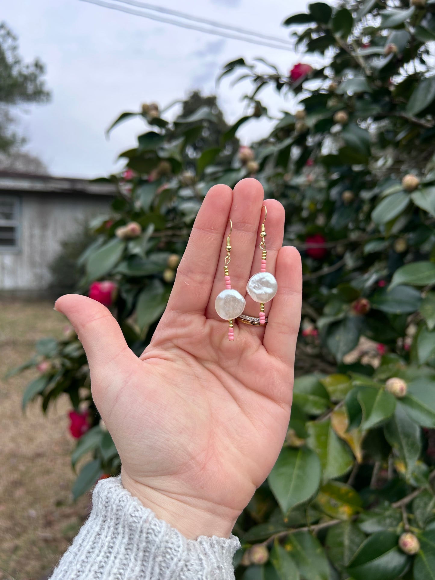 Hudson’s pearl earrings