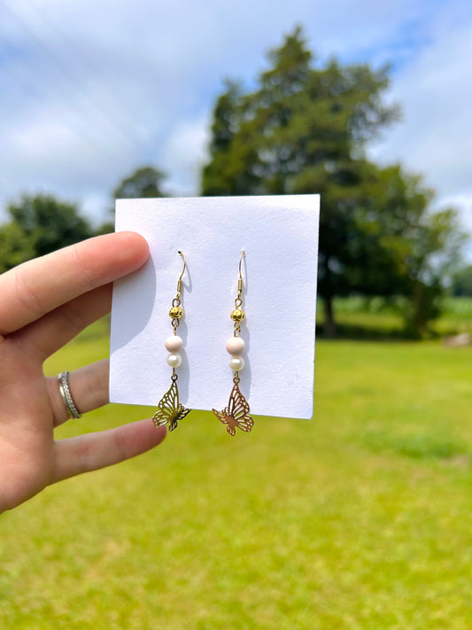 Pink butterfly dangle earrings