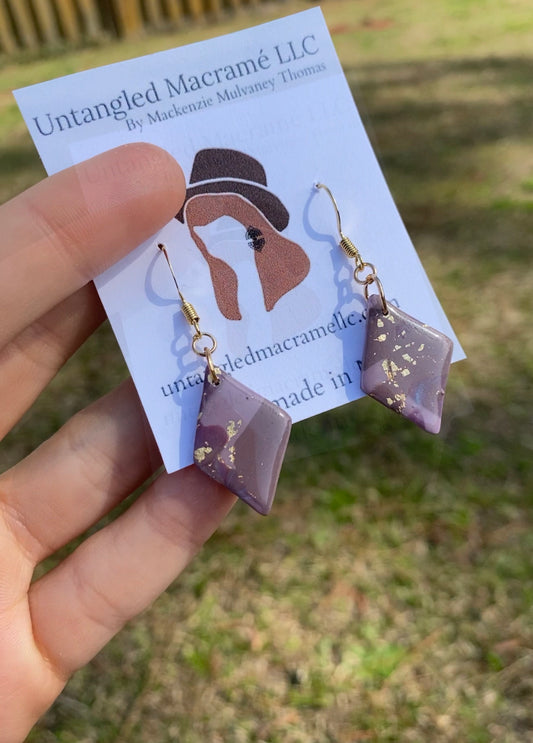 Purple and gold diamond earrings